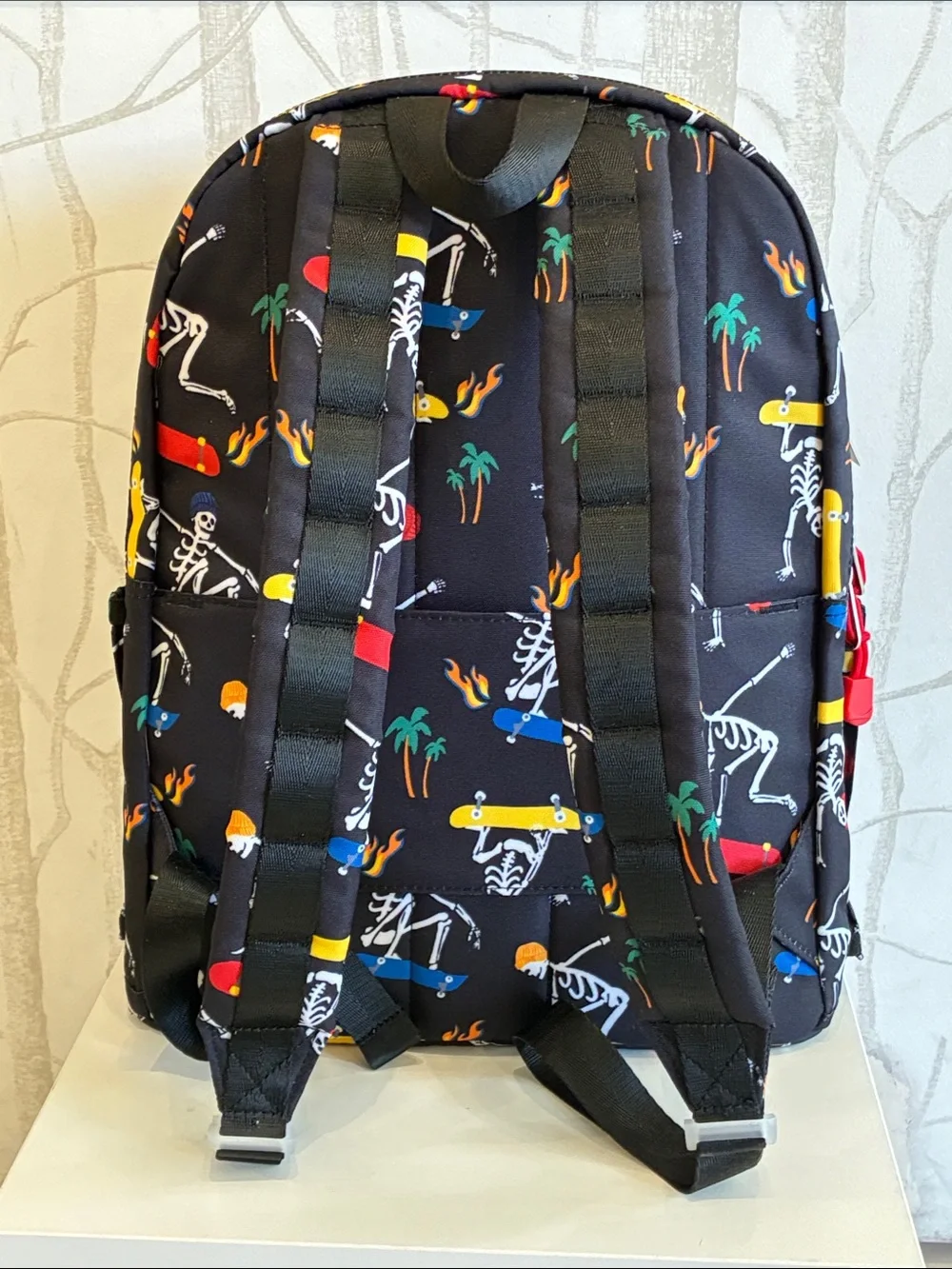STATE Black Backpack with Multicolor Skate Skeleton Print